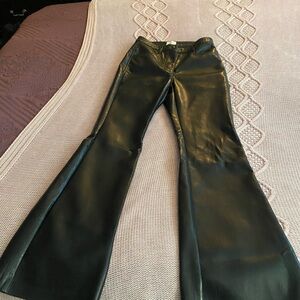 Beautiful faux leather semi wide leg pants. New without tags.